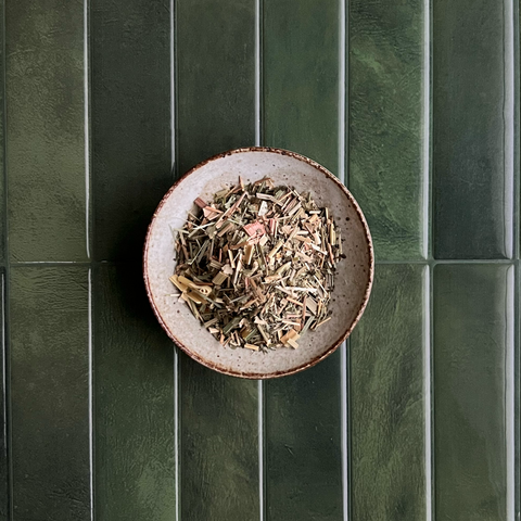 close up photo of herbs and roots to show details of this tea blend.