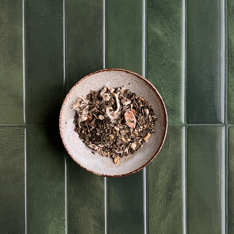 close up photo of herbs and roots to show details of this tea blend.